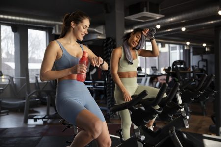 young-women-taking-part-spinning-class